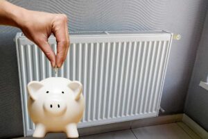 termosifone mano con salvadanaio