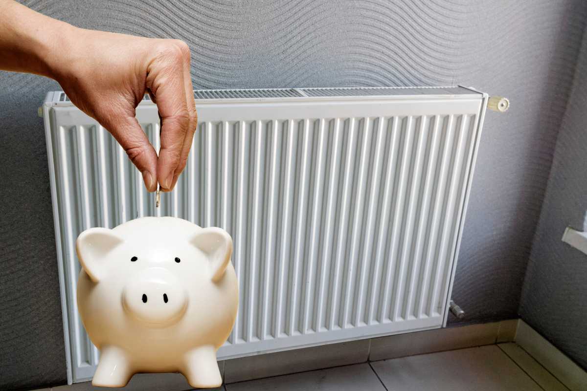 termosifone mano con salvadanaio